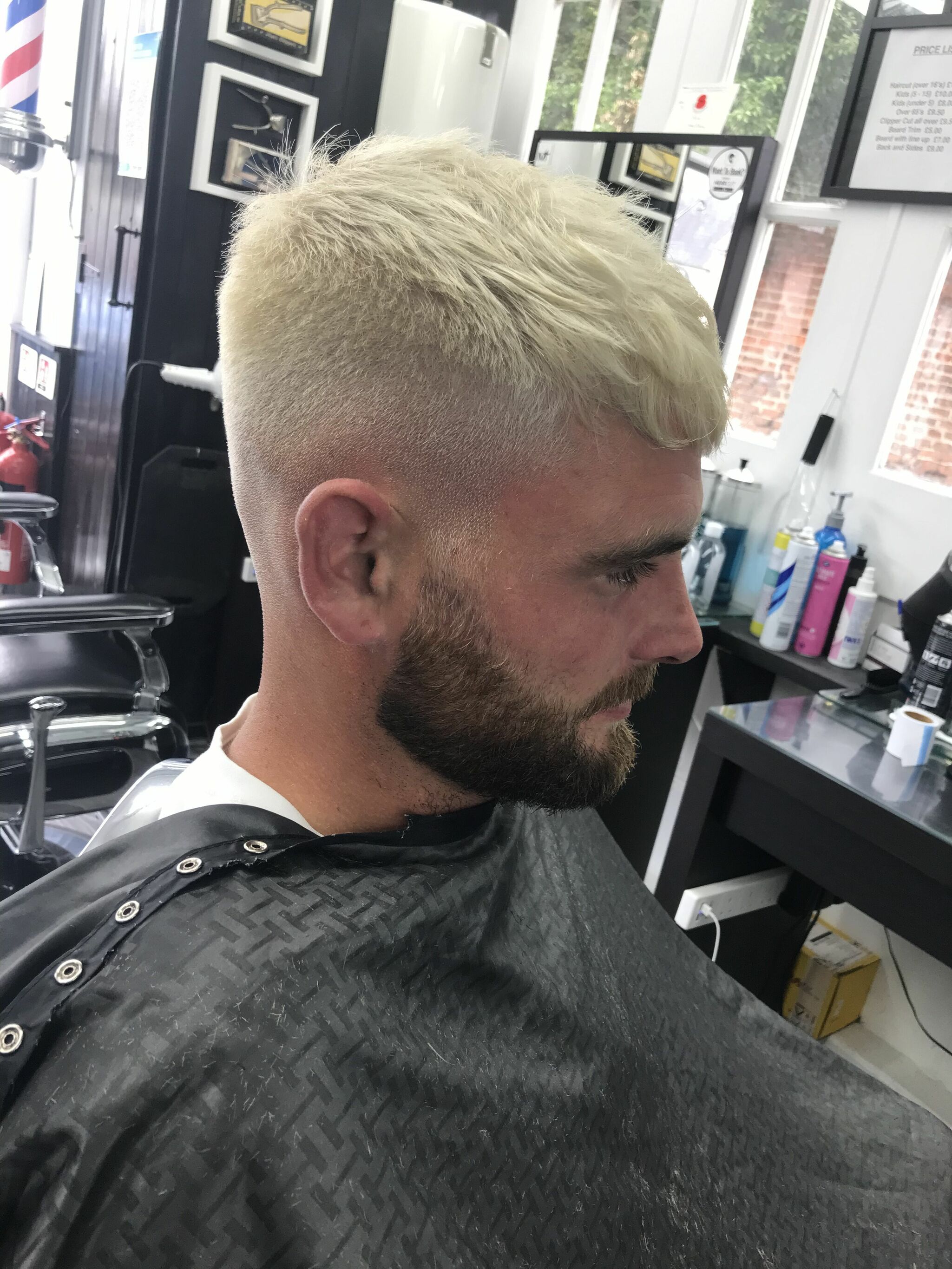 Bleached textured crop with a skin fade and a trimmed beard